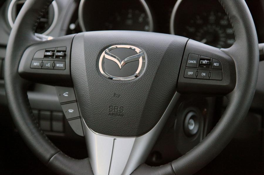  Mazda5 2012 года  (фото 23 из 94)